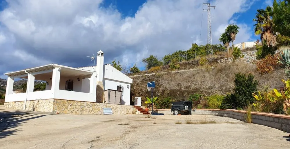 El terreno al lado de la casa